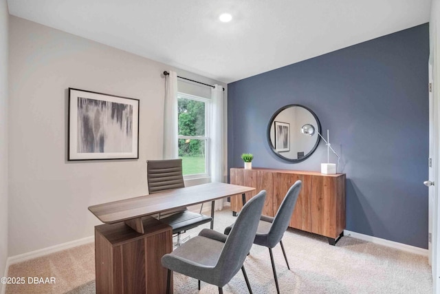 office area with light colored carpet