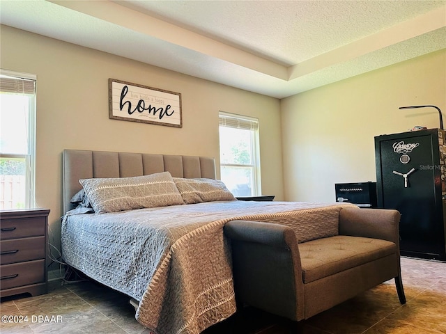 bedroom featuring a textured ceiling