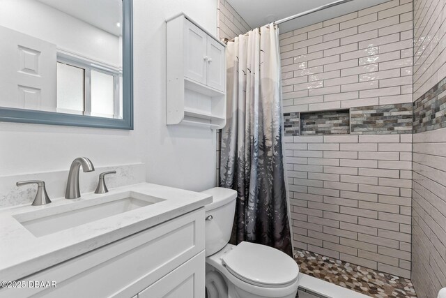1317 Dexter Dr W, Port Orange, FL 32129 - full bath with toilet, a tile shower, and vanity