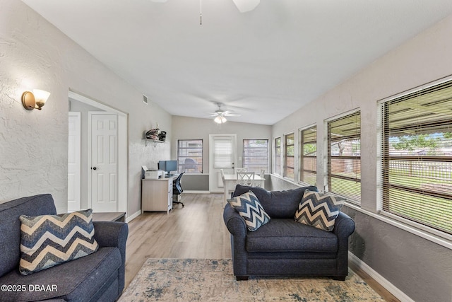 1317 Dexter Dr W, Port Orange, FL 32129 - living area featuring ceiling fan, an office area, wood finished floors, a textured wall, and baseboards