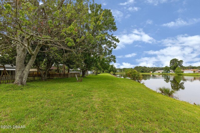 1317 Dexter Dr W, Port Orange, FL 32129 - view of yard featuring a water view