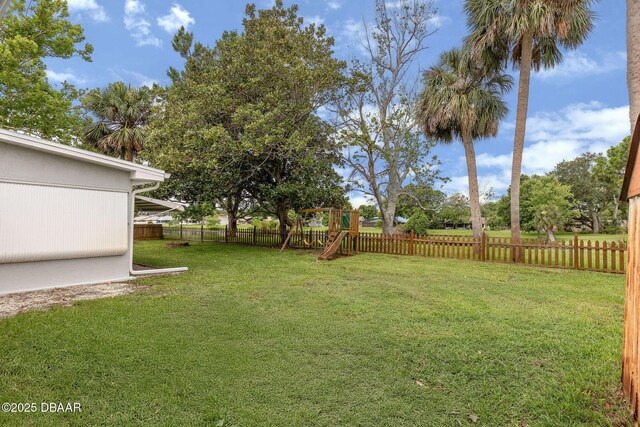 1317 Dexter Dr W, Port Orange, FL 32129 - view of yard featuring a playground