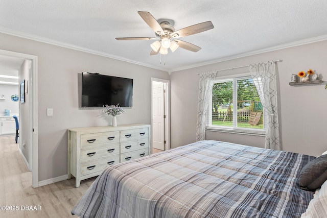 1317 Dexter Dr W, Port Orange, FL 32129 - bedroom featuring light wood-style floors, crown molding, baseboards, ceiling fan, and a textured ceiling