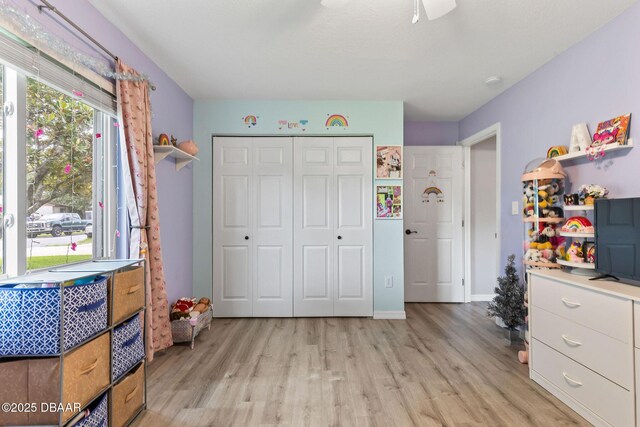 1317 Dexter Dr W, Port Orange, FL 32129 - playroom with light wood finished floors and baseboards