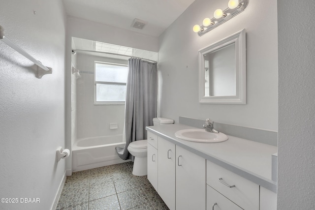 full bathroom with vanity, toilet, and shower / tub combo