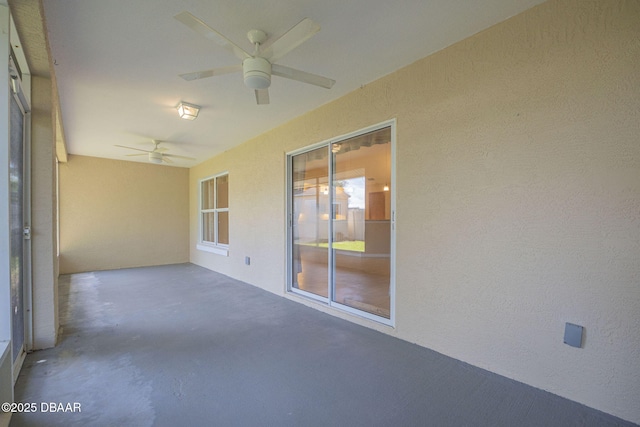 view of patio featuring ceiling fan