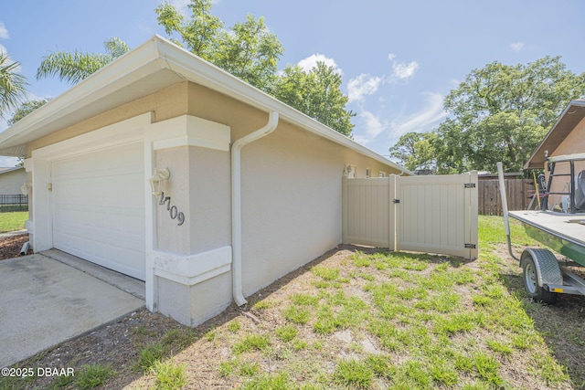 view of home's exterior with a garage