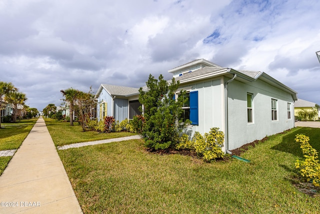 view of property exterior featuring a yard