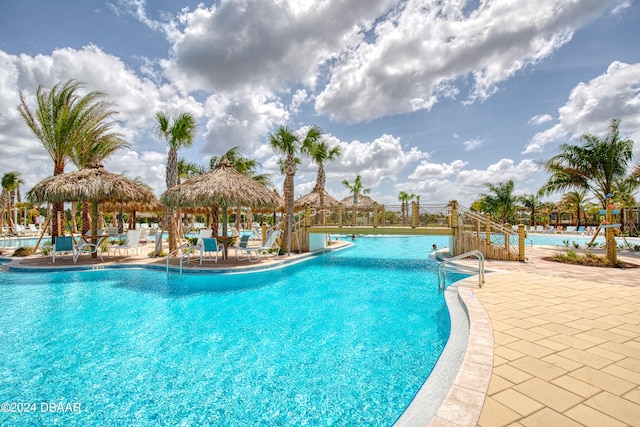 view of pool featuring a patio and a gazebo