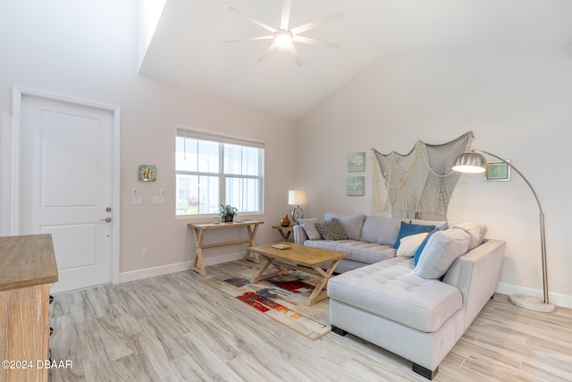 living room featuring light wood-type flooring, lofted ceiling, and ceiling fan