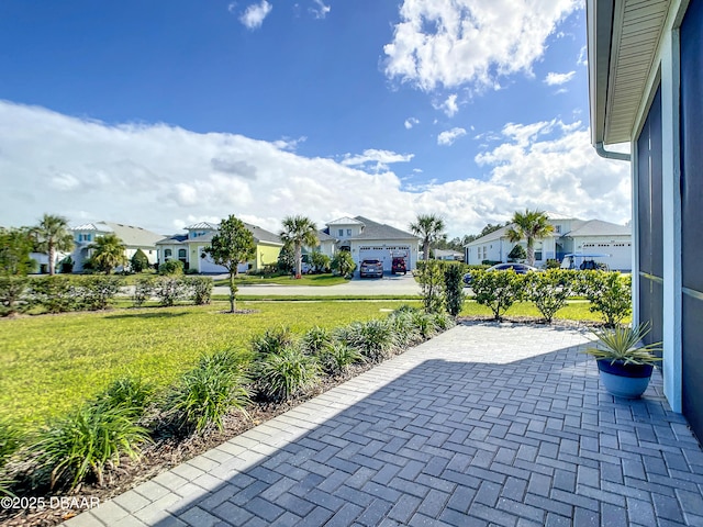 view of patio with a residential view