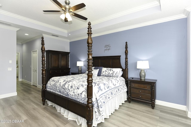 bedroom with light wood-style floors, baseboards, a ceiling fan, and visible vents