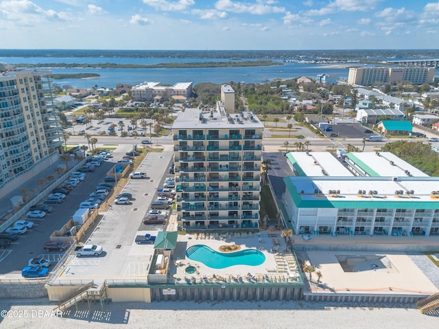 birds eye view of property featuring a water view