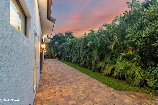 view of patio terrace at dusk