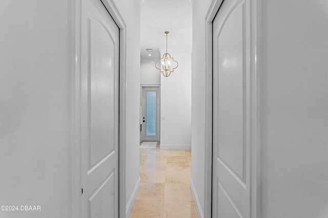 corridor with light tile patterned floors