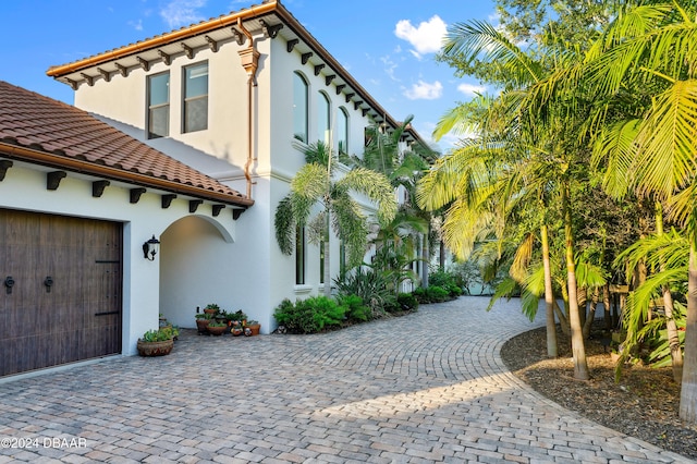 exterior space with a garage