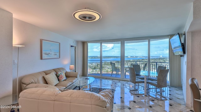 2625 S Atlantic Ave Unit 24Nw, Daytona Beach Shores, FL 32118 - living room with plenty of natural light and floor to ceiling windows
