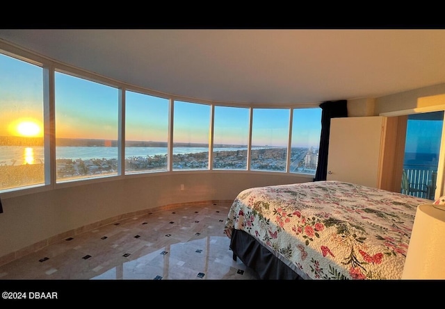 bedroom with a water view