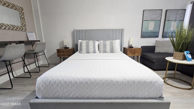 bedroom featuring wood-type flooring