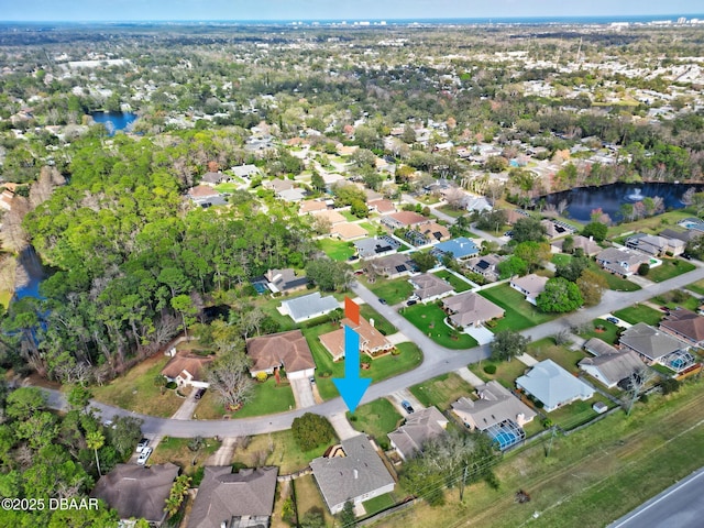 drone / aerial view featuring a water view