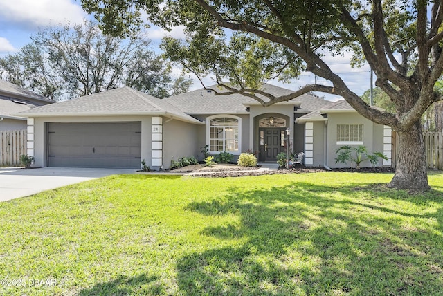 ranch-style home featuring a garage and a front lawn