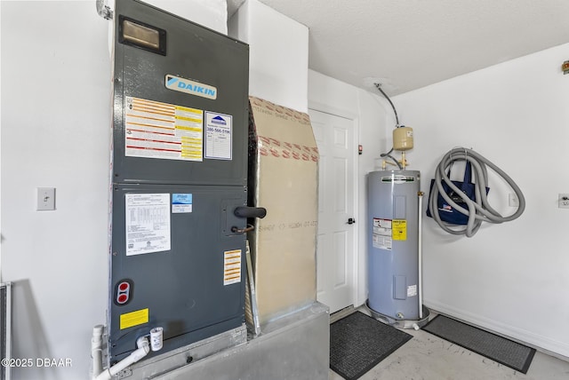 utilities featuring electric water heater and heating unit