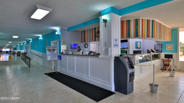 313 S Atlantic Ave Unit 413, Daytona Beach, FL 32118 - reception with a wainscoted wall and a decorative wall