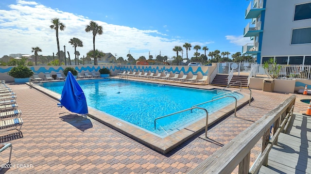 313 S Atlantic Ave Unit 413, Daytona Beach, FL 32118 - community pool with a patio area
