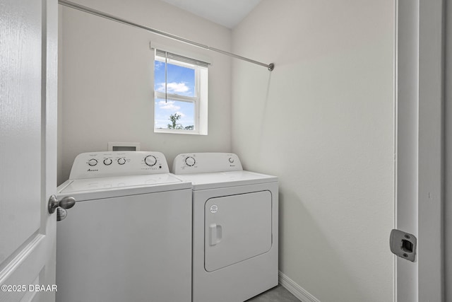 1323 Cork Dr, Ormond Beach, FL 32174 - washroom with washer and dryer and baseboards