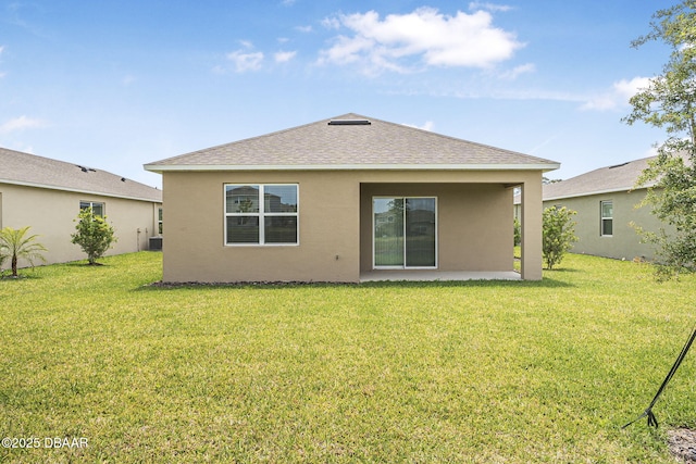 1323 Cork Dr, Ormond Beach, FL 32174 - rear view of property with stucco siding, a patio area, a lawn, and a shingled roof
