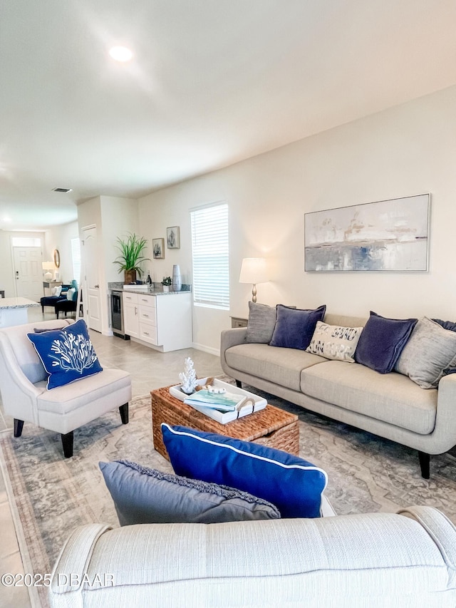 1323 Cork Dr, Ormond Beach, FL 32174 - living room featuring baseboards