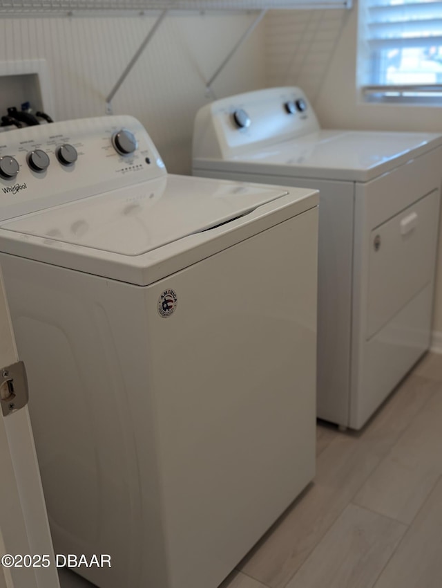 3103 Nova Scotia Way, New Smyrna Beach, FL 32168 - laundry area featuring independent washer and dryer