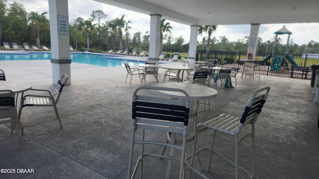 3103 Nova Scotia Way, New Smyrna Beach, FL 32168 - view of patio / terrace featuring a community pool