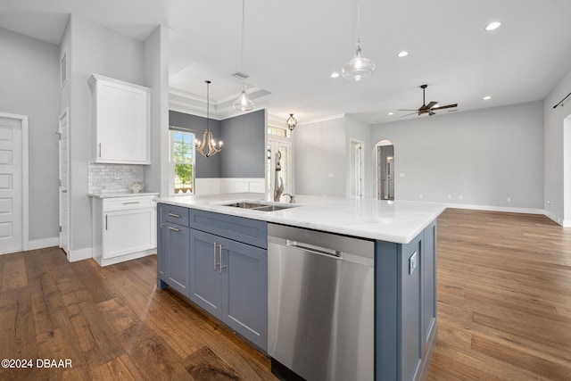 kitchen with a center island with sink, stainless steel dishwasher, hanging light fixtures, white cabinets, and dark hardwood / wood-style flooring