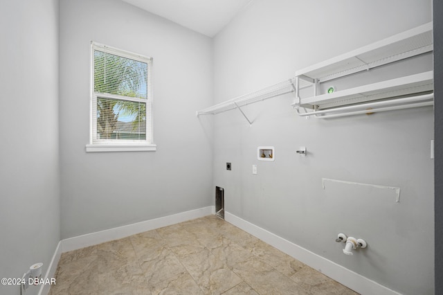 washroom featuring gas dryer hookup, washer hookup, and hookup for an electric dryer