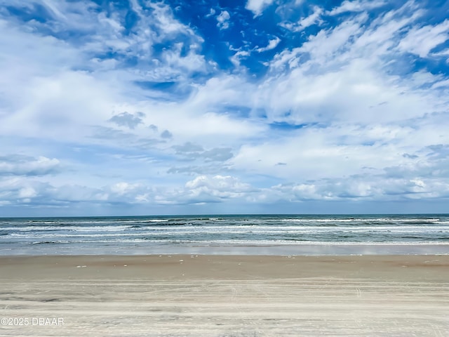 property view of water featuring a beach view