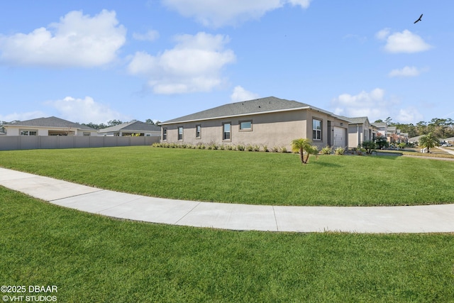 view of home's exterior featuring a lawn