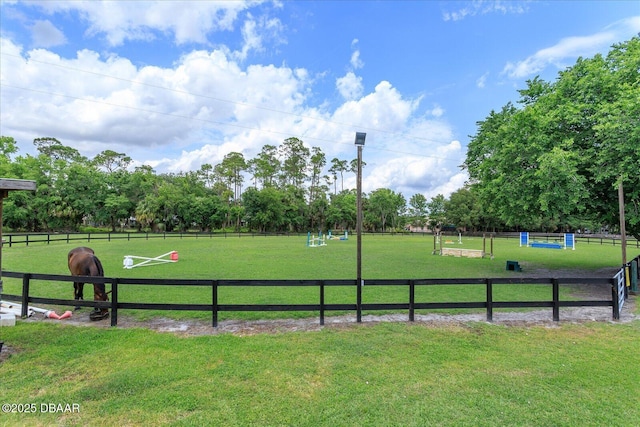 view of home's community with a lawn