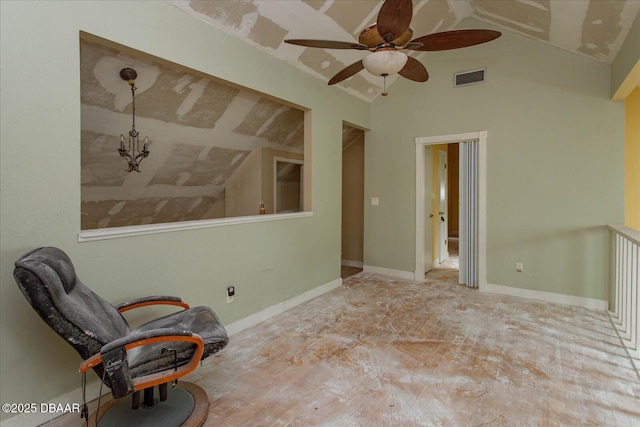 unfurnished room featuring ceiling fan and lofted ceiling