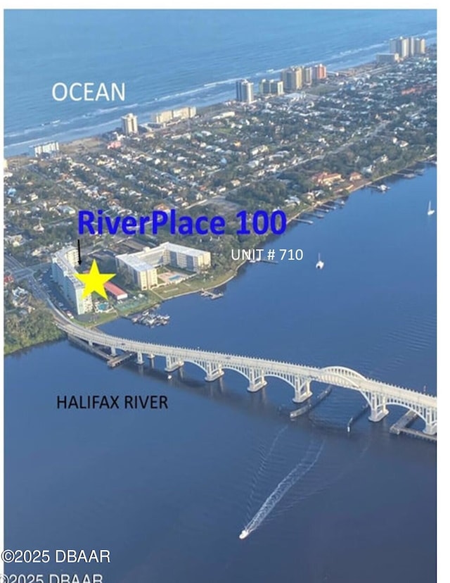 100 Silver Beach Ave Unit 710, Daytona Beach, FL 32118 - view of urban area with a large body of water and a notable bridge