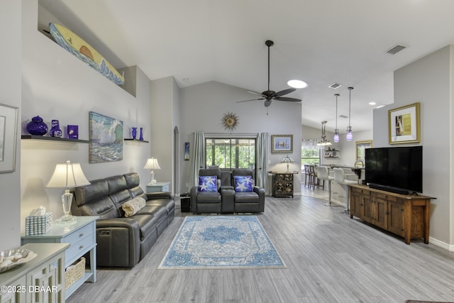 30 Foxfield Look, Ormond Beach, FL 32174 - living area with a ceiling fan, high vaulted ceiling, visible vents, and wood finished floors