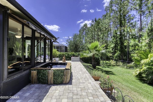 30 Foxfield Look, Ormond Beach, FL 32174 - view of yard featuring a patio, fence, and a sunroom