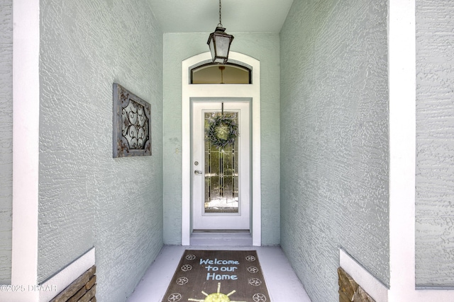 30 Foxfield Look, Ormond Beach, FL 32174 - property entrance featuring stucco siding