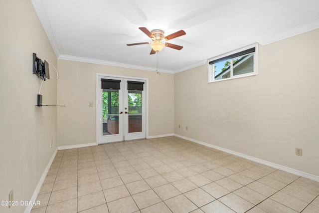 unfurnished room with a ceiling fan, ornamental molding, french doors, and baseboards