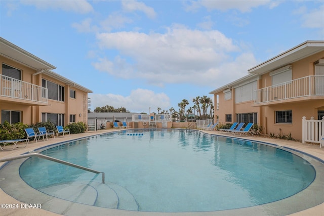 view of swimming pool featuring a patio