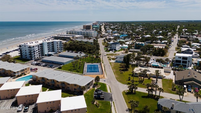 aerial view featuring a water view and a view of the beach