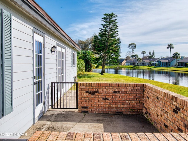 view of patio / terrace featuring a water view