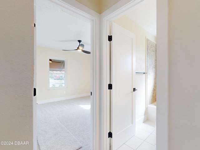 804 Soft Pine Ct, New Smyrna Beach, FL 32168 - hallway with light carpet and baseboards