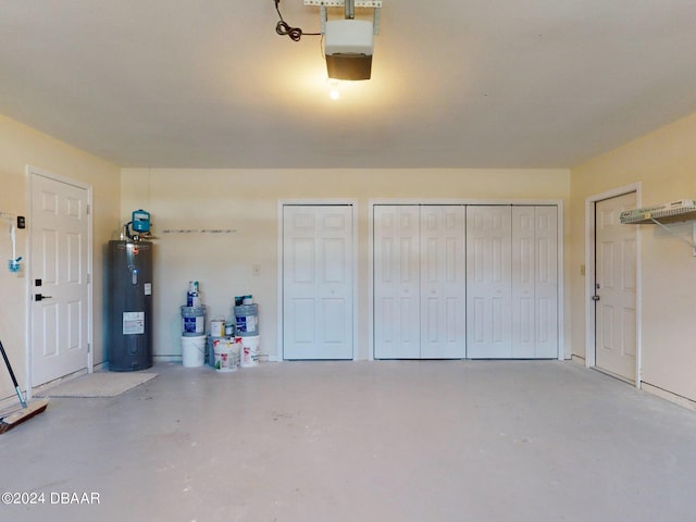 804 Soft Pine Ct, New Smyrna Beach, FL 32168 - garage featuring electric water heater and a garage door opener