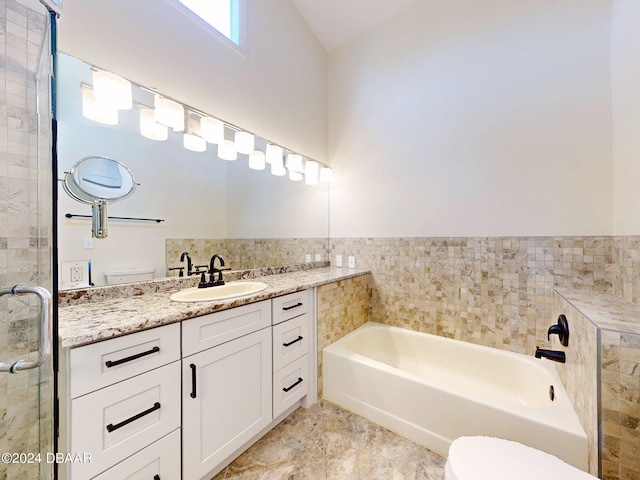 full bathroom featuring vanity, toilet, tile walls, and plus walk in shower